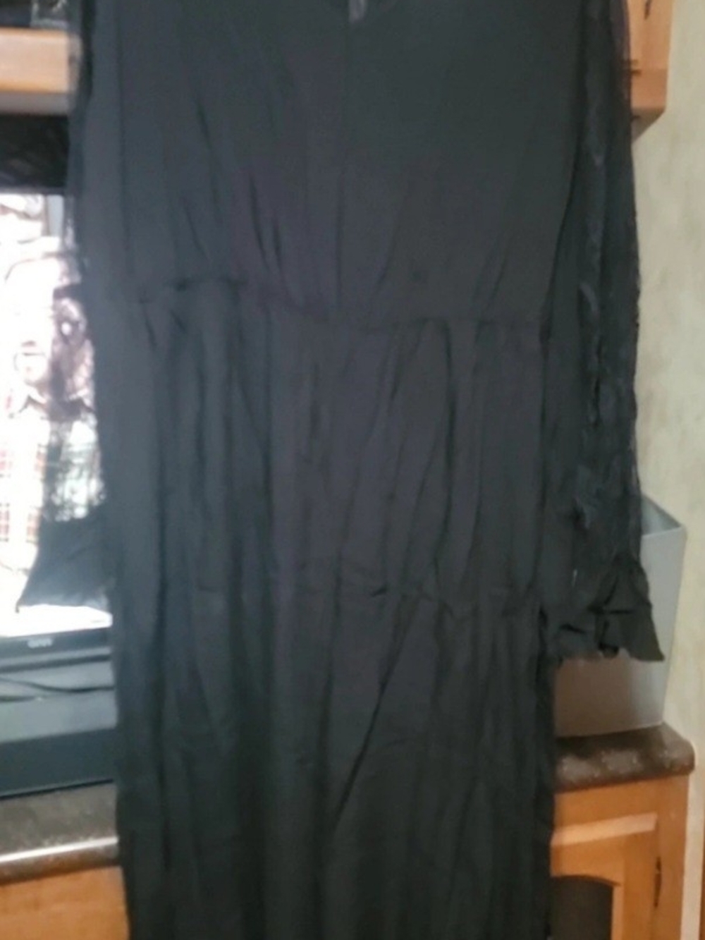 BloomChic Black Long Sleeve Jumpsuit with Sheer Sleeve Detail